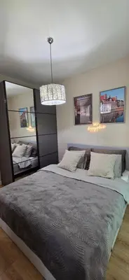 Łóżko lub łóżka w pokoju w obiekcie Fairytales Apartment River Point