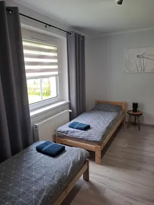Łóżko lub łóżka w pokoju w obiekcie Komfortowy Apartament KEPOS Lądek-Zdrój