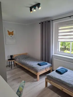 Łóżko lub łóżka w pokoju w obiekcie Komfortowy Apartament KEPOS Lądek-Zdrój