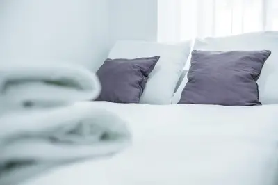 Łóżko lub łóżka w pokoju w obiekcie Apartament Górnych Wałów 21