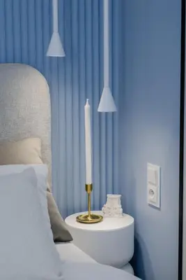 Łóżko lub łóżka w pokoju w obiekcie VelaLux Apartment