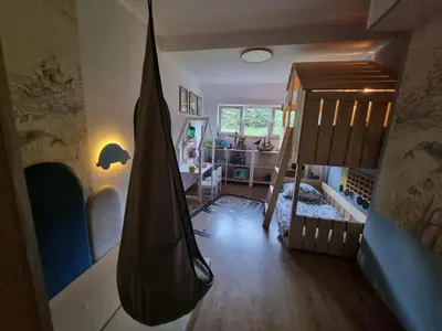 Łóżko lub łóżka w pokoju w obiekcie Pokoje Dla Rodzin z Dziećmi