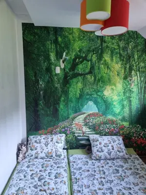 Łóżko lub łóżka w pokoju w obiekcie Pokoje Dla Rodzin z Dziećmi