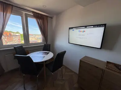 Telewizja i/lub zestaw kina domowego w obiekcie ApartamentsByMatyrafa-XIII