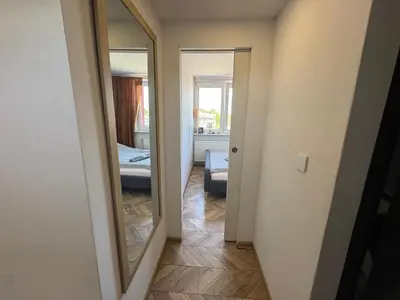 Łóżko lub łóżka w pokoju w obiekcie ApartamentsByMatyrafa-XIII