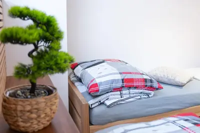 Łóżko lub łóżka w pokoju w obiekcie Apartamenty 592 2