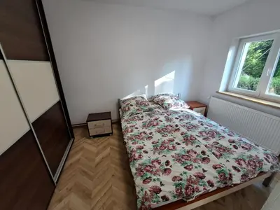 Łóżko lub łóżka w pokoju w obiekcie Pokoje na Bocznej