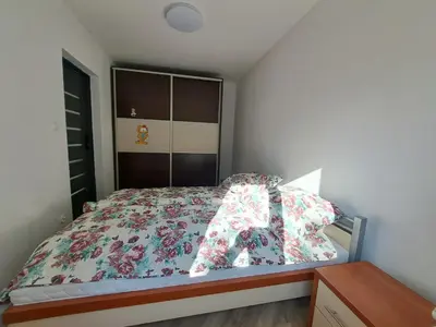 Łóżko lub łóżka w pokoju w obiekcie Pokoje na Bocznej