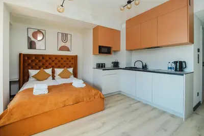 Łóżko lub łóżka w pokoju w obiekcie K52 Apartments
