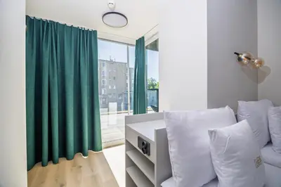 Łóżko lub łóżka w pokoju w obiekcie K52 Apartments