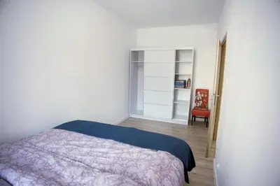 Łóżko lub łóżka w pokoju w obiekcie Apartament Arpika