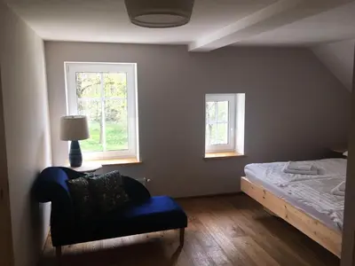 Łóżko lub łóżka w pokoju w obiekcie Villa Austeria