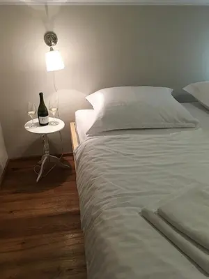 Łóżko lub łóżka w pokoju w obiekcie Villa Austeria