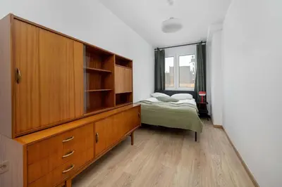 Łóżko lub łóżka w pokoju w obiekcie Large Apartment in Wrocław Center on the Market with 3 Bedrooms and Balcony by Noclegi Renters