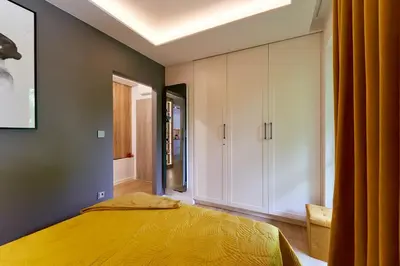 Łóżko lub łóżka w pokoju w obiekcie LAGUNA Apartament Polanica Residence 14 SPA z tarasem