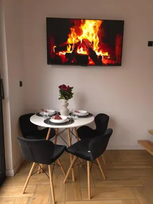 Telewizja i/lub zestaw kina domowego w obiekcie Treehouses