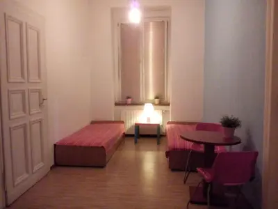 Łóżko lub łóżka w pokoju w obiekcie Apartament TO TU!
