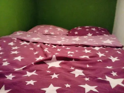 Łóżko lub łóżka w pokoju w obiekcie Apartament TO TU!