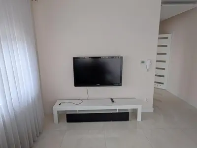 Telewizja i/lub zestaw kina domowego w obiekcie APARTMENT Wieluń 56 m