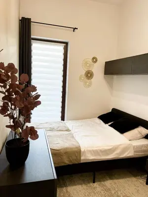 Łóżko lub łóżka w pokoju w obiekcie Apartament P52 Wrocław