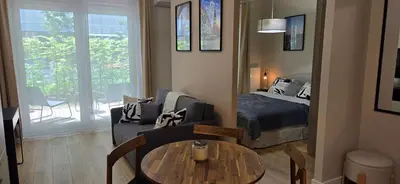 Łóżko lub łóżka w pokoju w obiekcie Fairytales Apartment River Point II