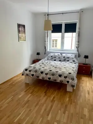 Łóżko lub łóżka w pokoju w obiekcie Apartament Lipowa