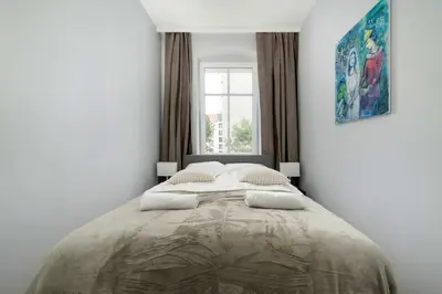 Łóżko lub łóżka w pokoju w obiekcie Stylish One Bedroom Apartment Perfectly Located by Noclegi Renters