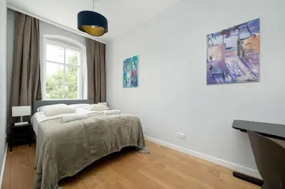 Łóżko lub łóżka w pokoju w obiekcie Stylish One Bedroom Apartment Perfectly Located by Noclegi Renters