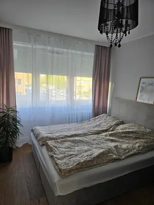 Łóżko lub łóżka w pokoju w obiekcie ApartPodmiejska
