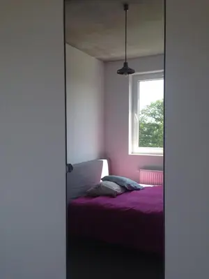 Łóżko lub łóżka w pokoju w obiekcie Mieszkanie w stylu Loft