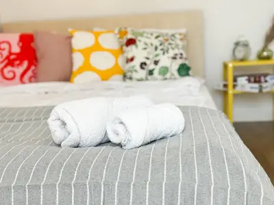 Łóżko lub łóżka w pokoju w obiekcie Kościuszki 4a Comfort Suite