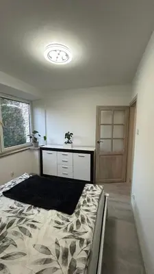 Łóżko lub łóżka w pokoju w obiekcie Apartament Nad Potokiem