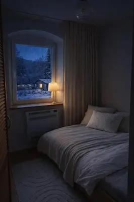 Łóżko lub łóżka w pokoju w obiekcie Apartament z kominkiem