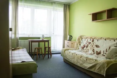 Łóżko lub łóżka w pokoju w obiekcie Pokoje przy Morzu