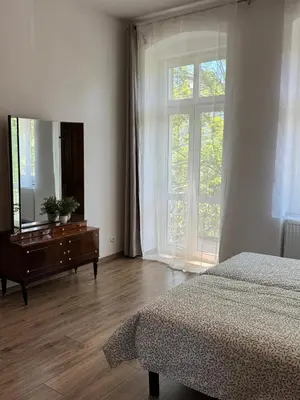 Łóżko lub łóżka w pokoju w obiekcie Pokoje u Bolka Świdnickiego