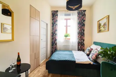 Łóżko lub łóżka w pokoju w obiekcie Apartamenty Katedralna Legnica
