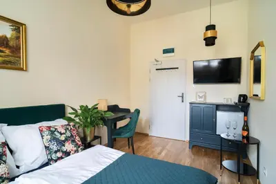 Telewizja i/lub zestaw kina domowego w obiekcie Apartamenty Katedralna Legnica