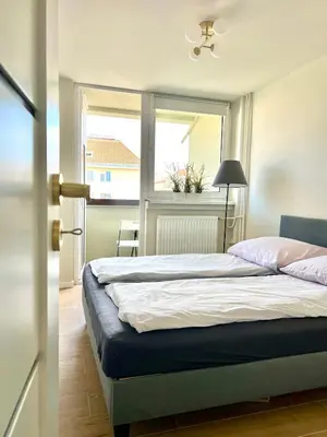 Łóżko lub łóżka w pokoju w obiekcie Legnica Apartament 36m2 Delux 3
