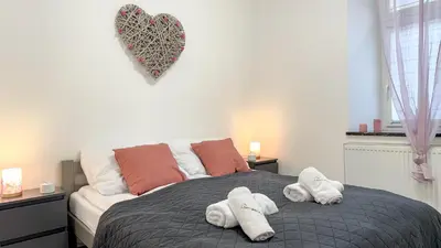 Łóżko lub łóżka w pokoju w obiekcie StayZdrój by LibertaRent