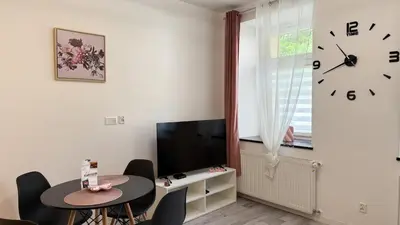 Telewizja i/lub zestaw kina domowego w obiekcie StayZdrój by LibertaRent
