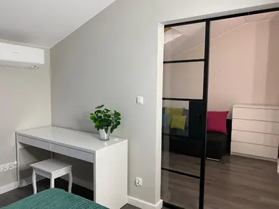 Łóżko lub łóżka w pokoju w obiekcie Dwupoziomowe Komfortowe Mieszkanie Krzyki z Dwiema Łazienkami