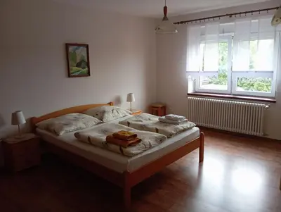 Łóżko lub łóżka w pokoju w obiekcie Agroturystyka Agro Greupner