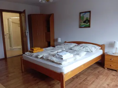 Łóżko lub łóżka w pokoju w obiekcie Agroturystyka Agro Greupner