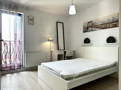 Łóżko lub łóżka w pokoju w obiekcie Dubois 7 Apartment - Self Check-In 20h - LIFT