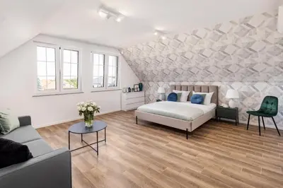 Łóżko lub łóżka w pokoju w obiekcie Apart House A4 Wrocław