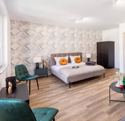 Łóżko lub łóżka w pokoju w obiekcie Apart House A4 Wrocław