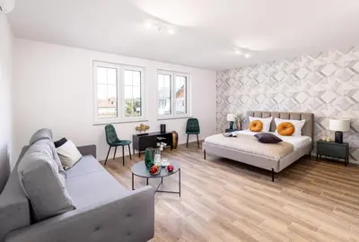 Łóżko lub łóżka w pokoju w obiekcie Apart House A4 Wrocław