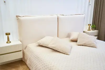 Łóżko lub łóżka w pokoju w obiekcie Polanica Park -LAGUNA - PREMIUM 2
