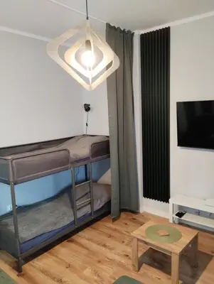 Telewizja i/lub zestaw kina domowego w obiekcie Apartament 103