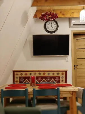 Telewizja i/lub zestaw kina domowego w obiekcie Siódme Niebo domek w górach